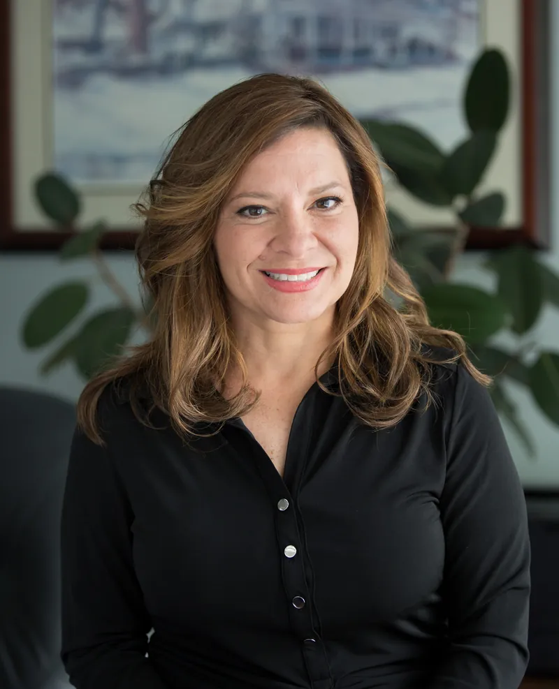 Karen with natural-looking hair system results, relaxed and confident