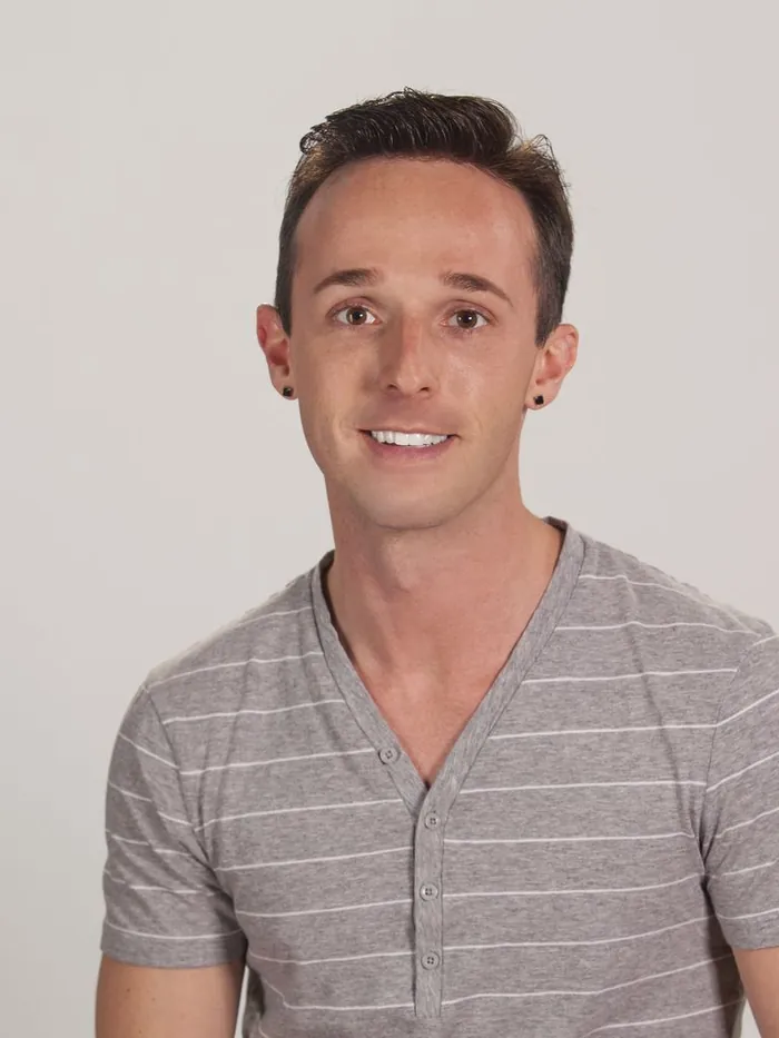 After: a full natural hairline with a custom non-surgical mens hair system from National Hair Centers