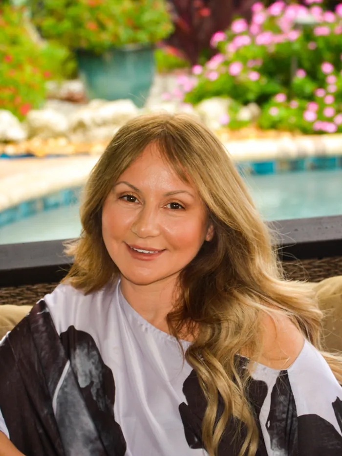 Tracy after: full, natural hair with a non-surgical women's hair replacement system at National Hair Centers in Phoenix, Arizona