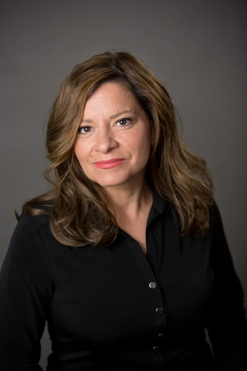 Karen after: full, natural hair with a custom women's hair replacement system from National Hair Centers